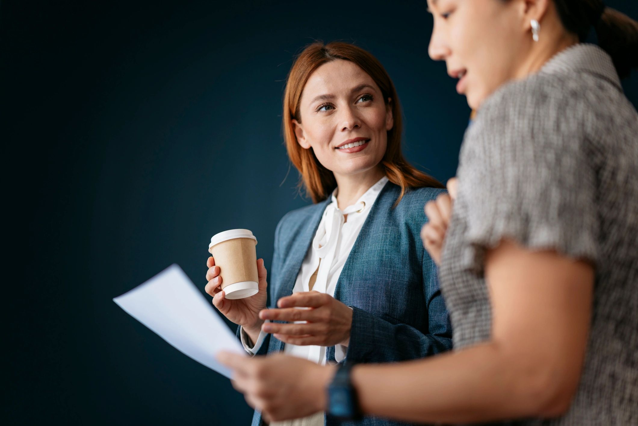 Two professionals collaborating on career planning